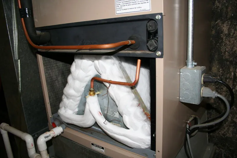 Ice on the AC / Heat Pump Outdoor Condenser, Refrigerant Lines, or Indoor Coil frozen coils - TemperaturePro San Antonio